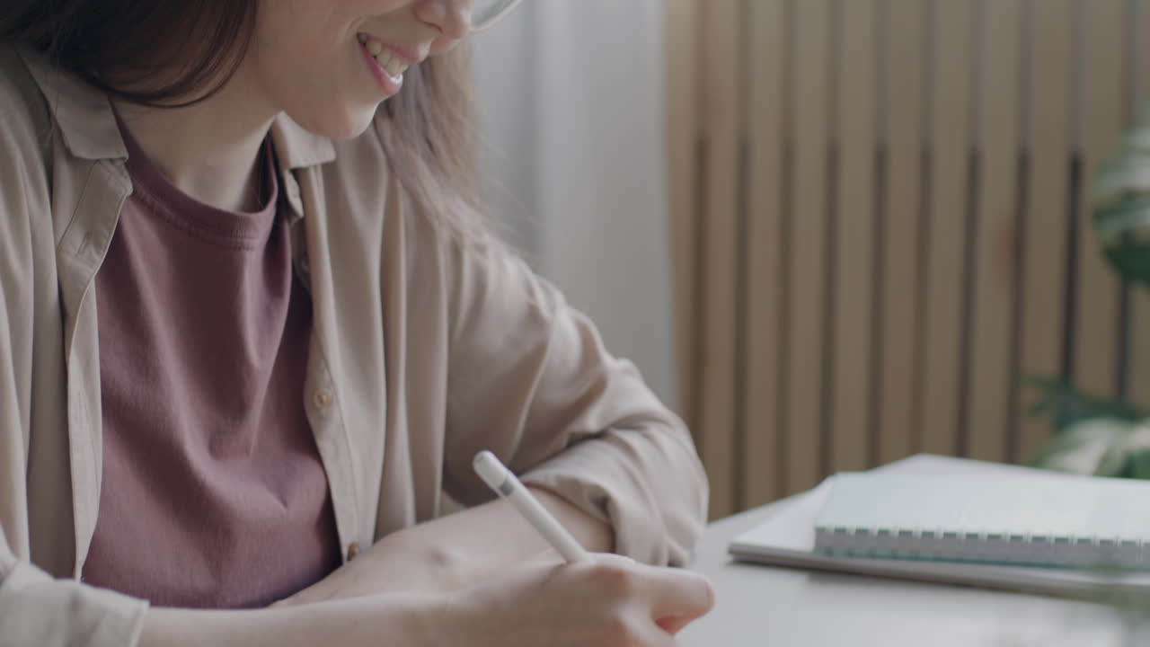 Woman working on digital tablet