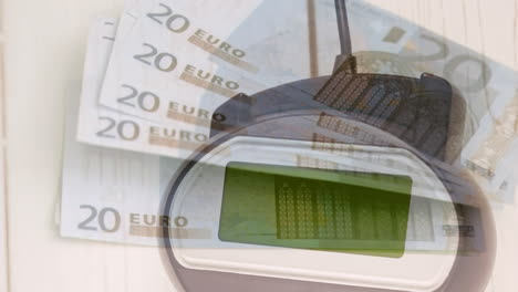 animation of euro banknotes falling over payment terminal