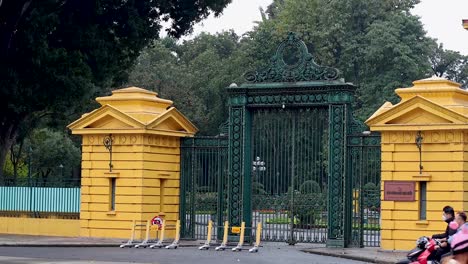 vehicles passing by the palace gate