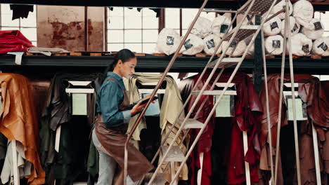 tablet, leather workshop and woman on steps