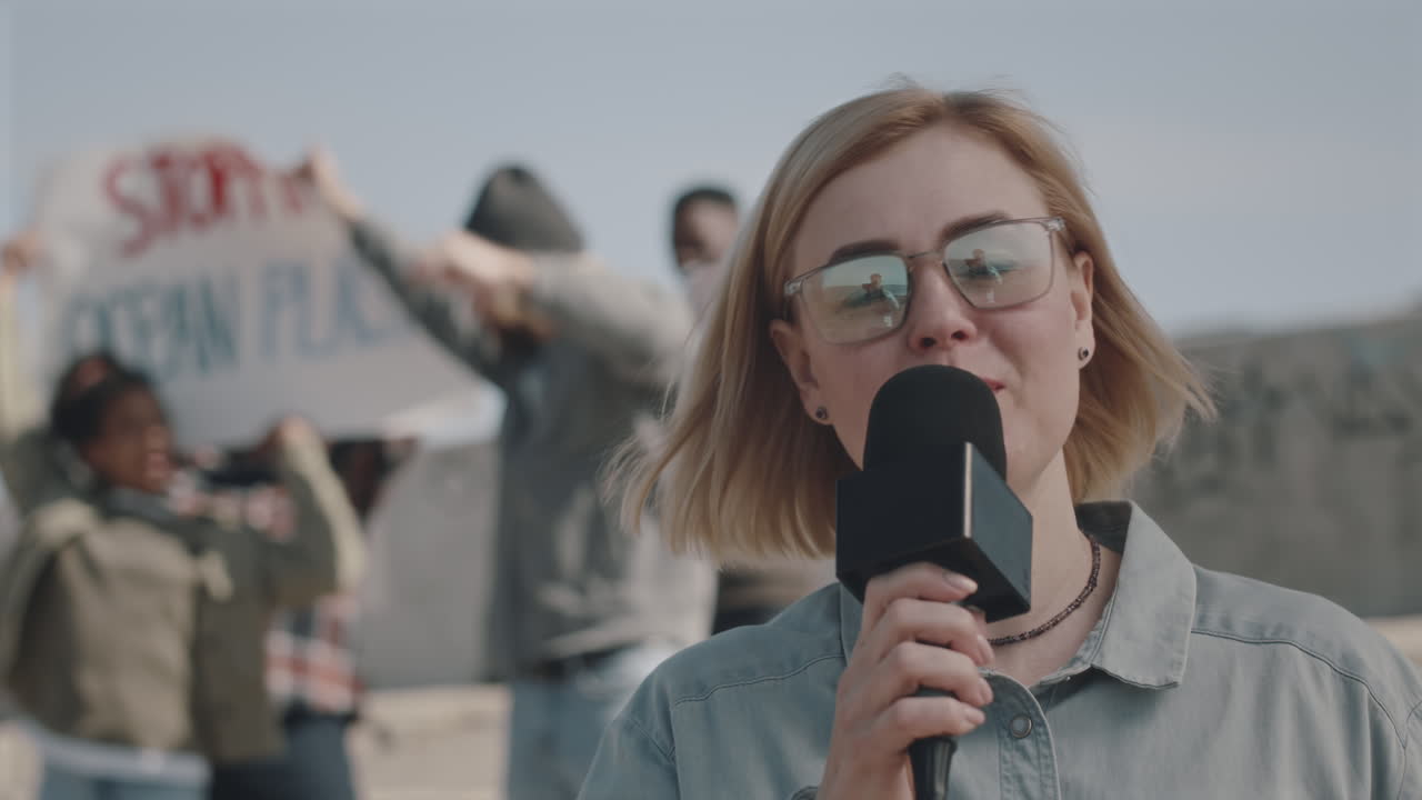 TV Reporter Reporting on Protest against Environmental Pollution