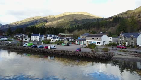 village of lochgoilhead, scottish highland, aerial dolly forward