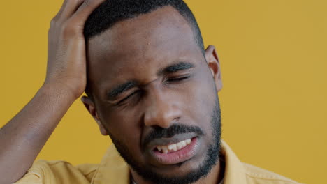 man experiencing headache