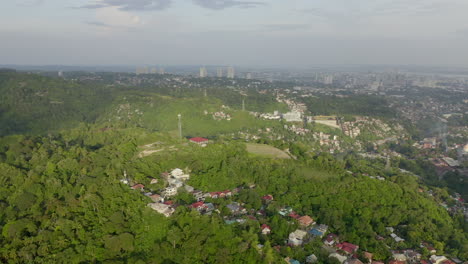 Aerial-drone-video-above-a-green-jungle-in-a-warm-tropical-foreign-country-7