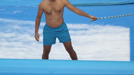 man surfing in an indoor wave pool