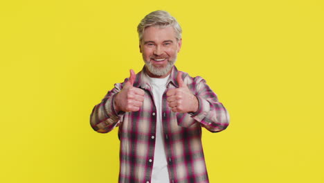caucasian man raises thumbs up agrees give positive reply recommends advertisement likes good idea