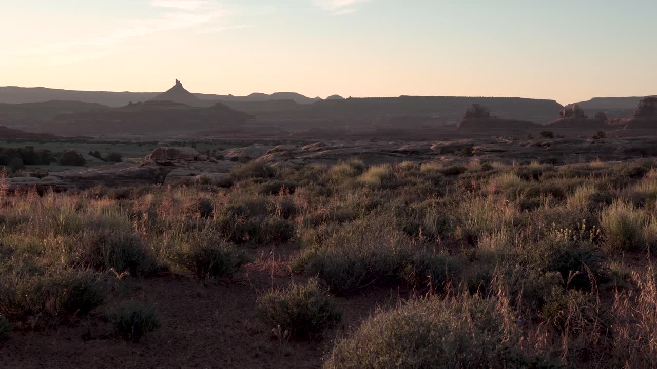 Desert monuments of sandstone at the Canyonlands national park in Utah, Aerial dolly in shot