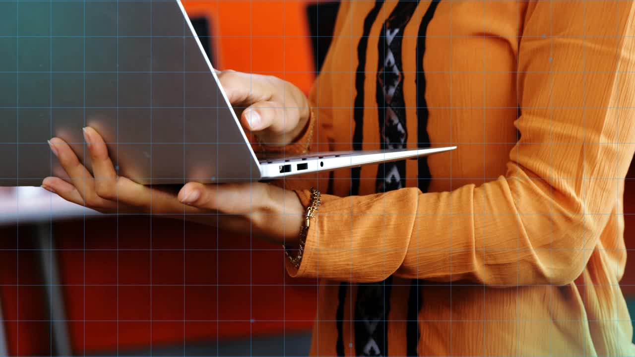 Woman tapping trackpad and activating tech HUD around laptop scrolling, speaking for data analysis