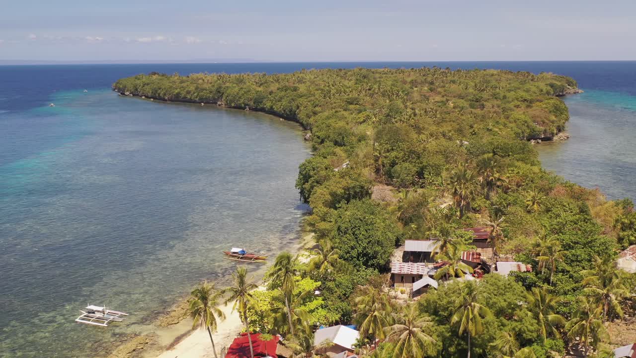 Aerial drone above seaside residential homes on Boracay Island, Philippines