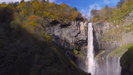 Beautiful-wide-view-out-on-Kegon-Falls-in-Nikko,-Japan-with-autumn-colors