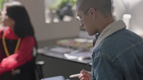 young-business-people-meeting-african-american-team-leader-woman-using-tablet-computer-showing-creative-project-ideas-on-screen-sharing-strategy-colleagues-collaborating-in-office-briefing