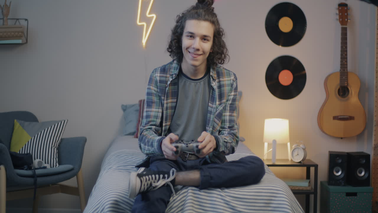 Teenager Gaming in Bedroom
