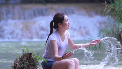 Asian Girl Enjoy With Waterfall