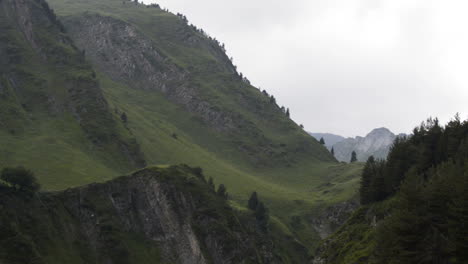 panning shot of mountains in a cloudy day in aran valley