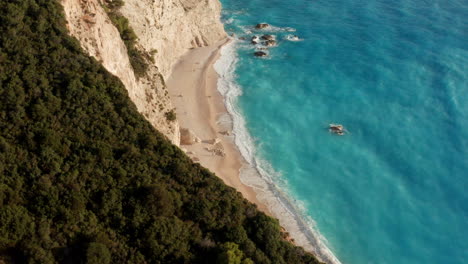 beautiful beach of porto katsiki at the concave cliff in lefkada island, greece