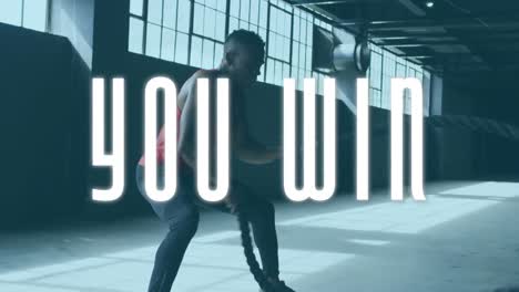 animation of you win text over mixed race man exercising with ropes
