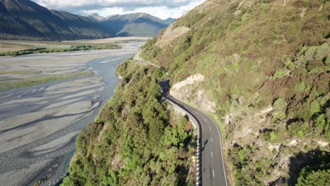 new zealand mountainside road driving drone