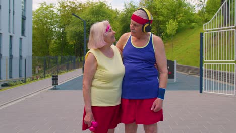 active senior man, woman after fitness cardio exercises, smiling looking at camera, sport motivation