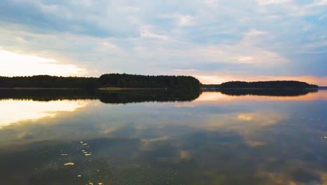 Aerial-Shot-of-Lake-at-Sunset