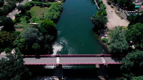 Aerial-above-the-Lez-river-with-a-view-of-the-suburbs-and-farm-land-in-Montpellier,-France