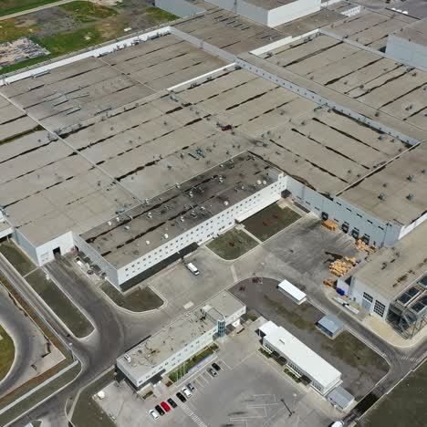 roofs of industrial buildings. large manufacture on field. innovative production plant outside. industry. top aerial view.