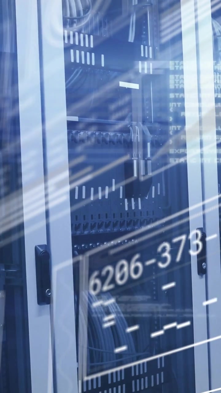 Vertical video: Camera panning across server cabinet glass, HUD labels marking ports for monitoring