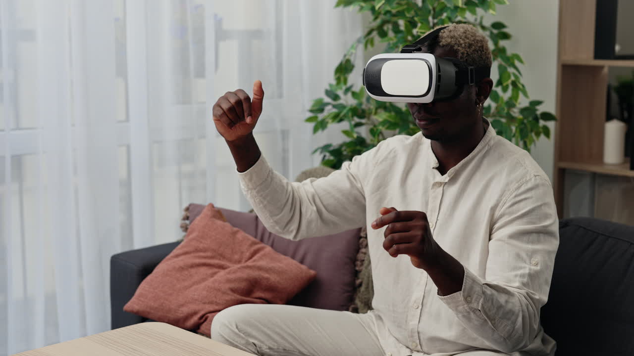 Man Using VR Headset at Home