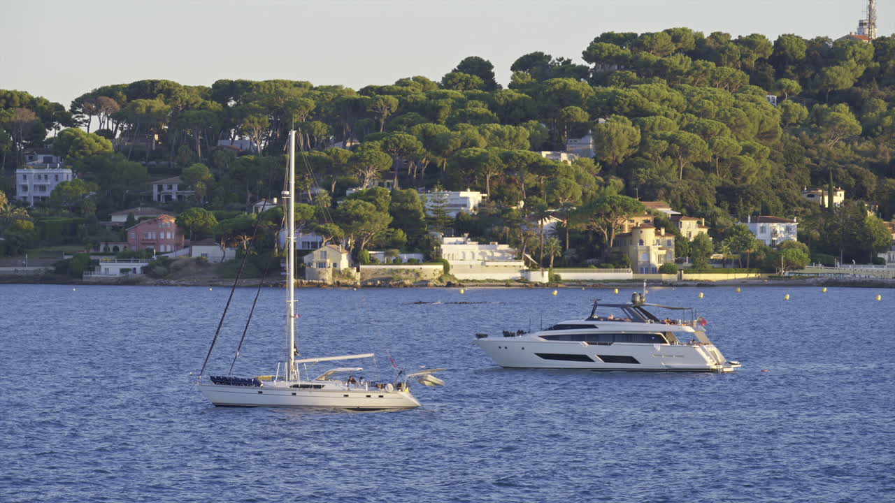 Boats floating on the Mediterranean Sea in daylight in Antibes, France