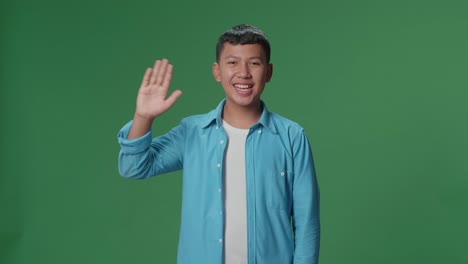 teenager waving