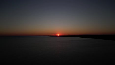 pan shot of the sunset in a beach in port stanley, ontario, canada