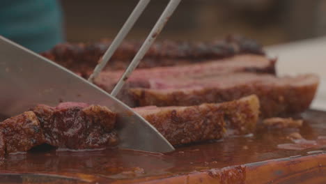 chef cutting the roast beef, juicy and extremely soft