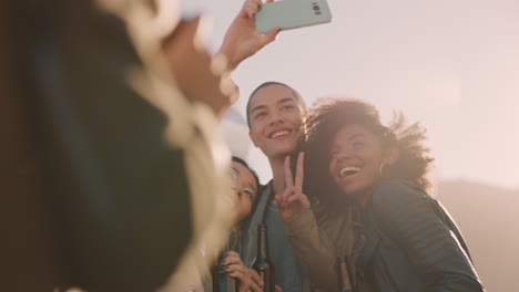 happy rooftop party friends having fun young asian woman taking group photos using smartphone sharing weekend lifestyle on social media at sunset