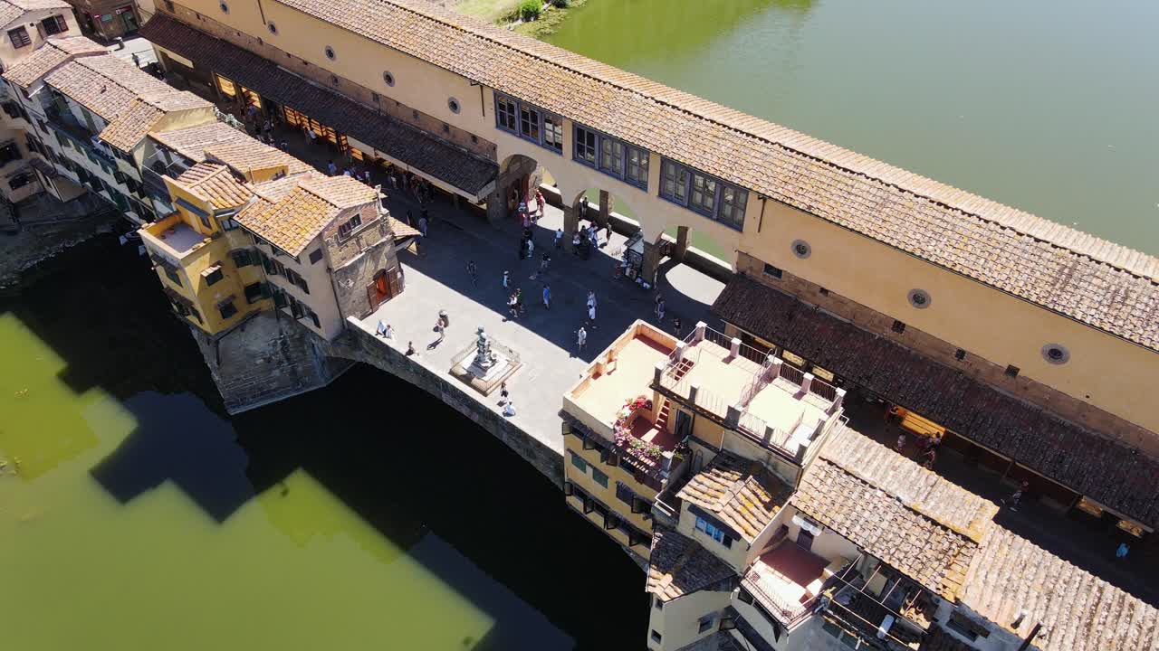 Drone cinematic shot Ponte Vecchio Florence Italy cultural heritage landmark