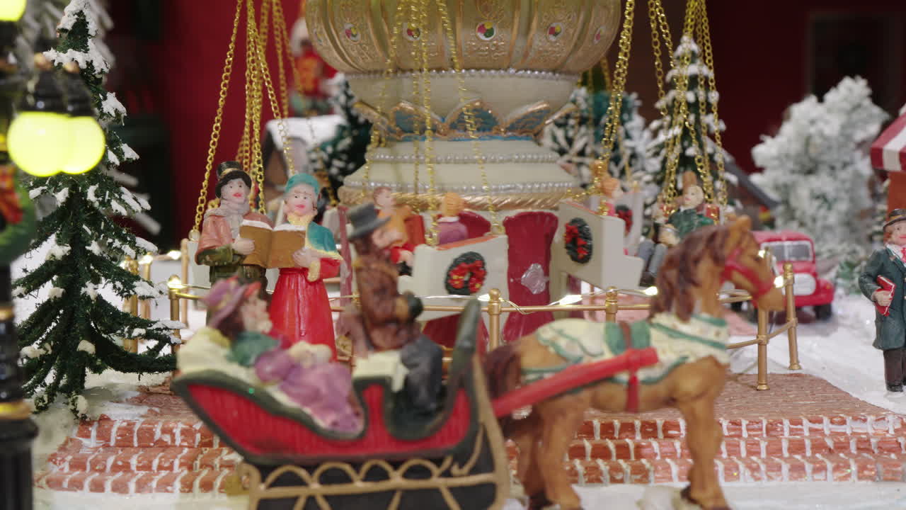 Miniature Christmas Village with Moving Carousel and Sleigh