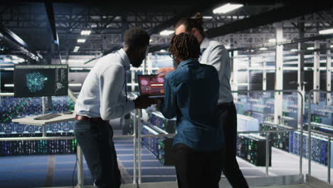 worried workers trying to fix hacked infrastructure systems