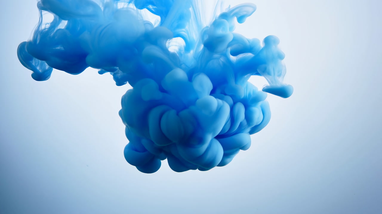 Blue Ink Plume Drifting Against Pale Backdrop, High Key Lighting Reveals Bulbous Forms And Soft Gradients,