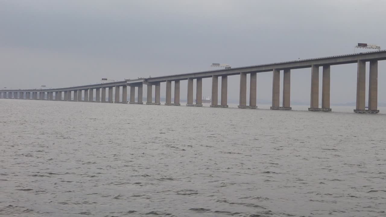 Rio Niteroi Bridge Crosses Guanabara Bay At Early Morning From Sailing Boat. - POV, wide shot