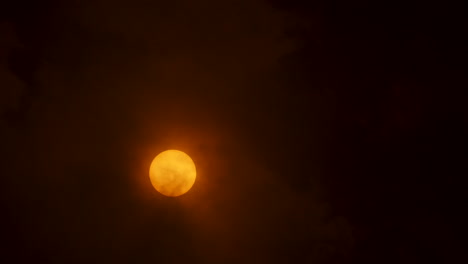 clouds moving in front of the sun