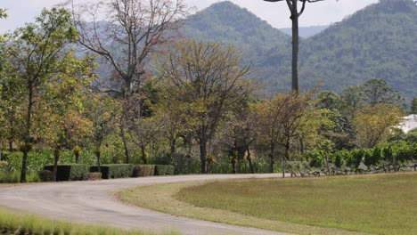 time-lapse of a curving park pathway and mountains