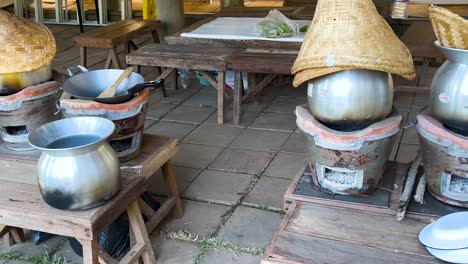 charcoal stoves with pots and baskets