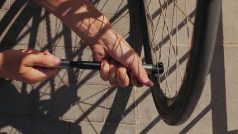 inflating a bicycle tire