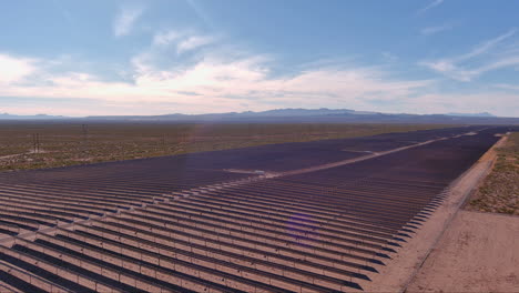 cinematic wide rotating drone shot of a solar farm in arizona, solar panels