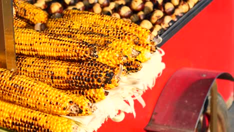 grilled corn on a food cart