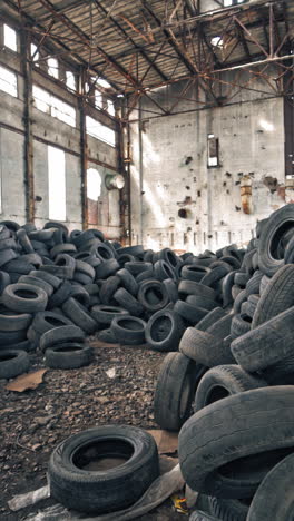 old damaged tires after driving. stack of car second used car rubber tires vertical video