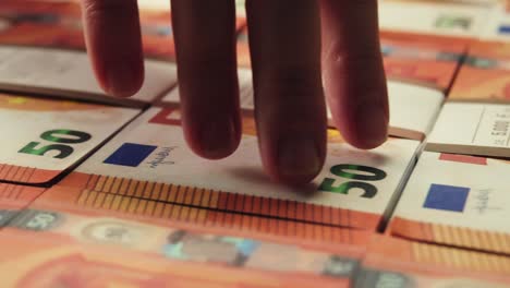 stacks of cash dollars and euro, banknotes counting, specialised police officer counting dollar euro banknotes in crime lab with machine, cashed out money, bitcoin changing, buying home flat in bank.