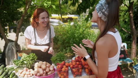 women at a farmers market