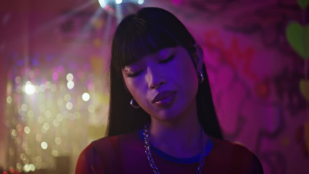 Thoughtful girl texting mobile phone enjoy festive club atmosphere closeup