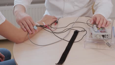 patient nerves testing using electromyography at medical center