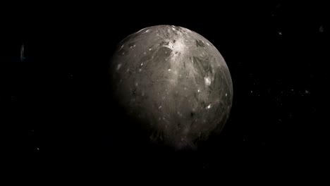 ganímedes, la luna de júpiter, girando en su propia órbita en el espacio exterior.