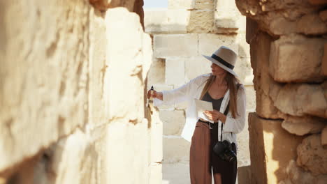 woman restoring ancient ruins